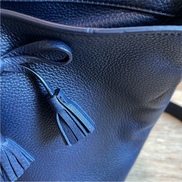 Kate Spade mini bucket bag. Never used. Missing tags but has care card. - Picture 7 of 11